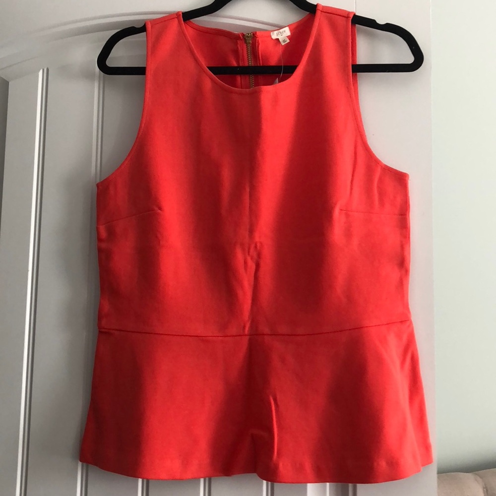 New with Tags sleeveless Coral Ponte Peplum top